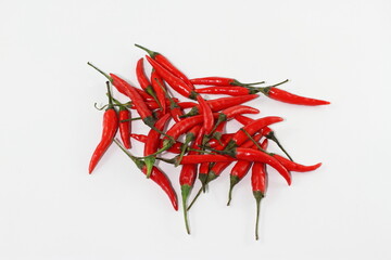 Raw red pepper, bunch of chili pepper on white