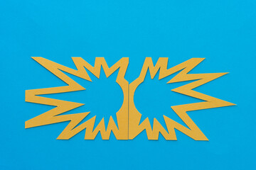 Fototapeta na wymiar two irregular abstract shapes on blue paper