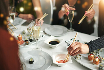Obraz na płótnie Canvas Good food, good friends, good times. Shot of friends having a dinner party at a restaurant.