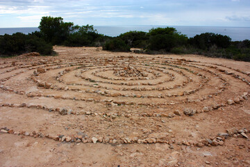 Fototapeta na wymiar wonderful magical stone spiritual spirals of the hippies on the coasts of ibiza and its shamanic swirls in circles
