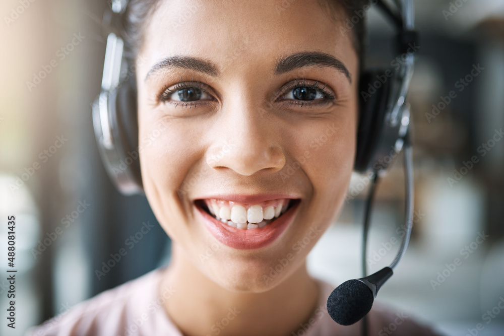 Poster how can i be of help. cropped portrait of an attractive young woman working in a call center.