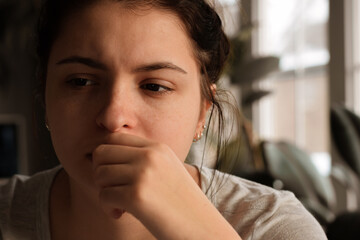 Fototapeta na wymiar Closeup portrait of sad upset or troubled young teenage girl