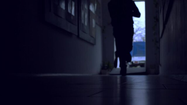 Woman running from a rapist in the lobby of building