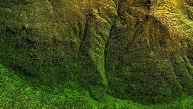Digital elevation model. GIS product made after proccesing aerial pictures taken from a drone. It shows high rocky and steep mountain peaks. At their feet are visible valleys and mountain lakes