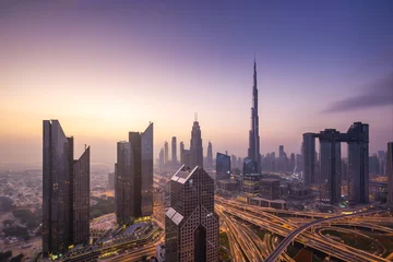 Behang Burj Khalifa Moderne skyline van de stad en stadsgezicht bij zonsopgang in Dubai VAE