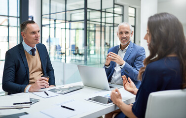 Defining the steps to success. Cropped shot of businesspeople having a meeting in a modern office.