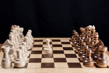 The white pawn made its first move. Opening.  Chess, the beginning of the game. The concept of...