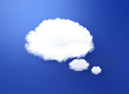 White cloud shape of a thinking balloon at 
blue background, concept communication.