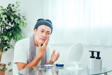 肌荒れしている男性（困る）
