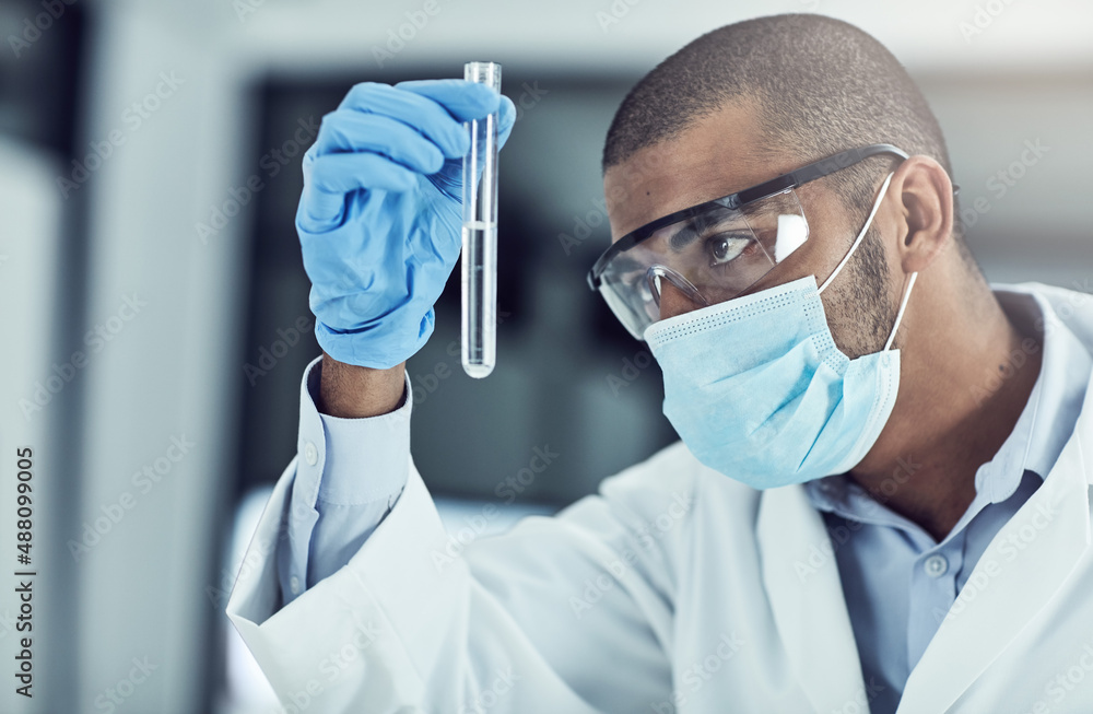 Poster the mysteries of the physical and chemical world intrigue me. shot of a young scientist conducting a