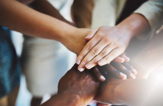 Were All Deeply Committed To Our Mission. Cropped Shot Of A Group Of Businesspeople Piling Their Hands On Top Of Each Other.