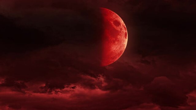 Creepy blood moon,red moon,The bloody full moon on the clouds.