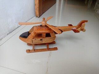 Child's toy helicopter made of wood