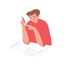 Male character coloring a car model. A young man enjoys engaged in a hobby. A person spends his leisure time. Cartoon vector flat illustration on an isolated white background.