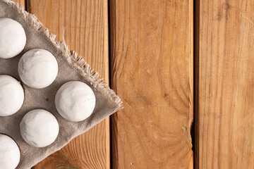 Homemade cookies with nuts, chocolate and milk on a wooden table and art background. Breakfast. Close.