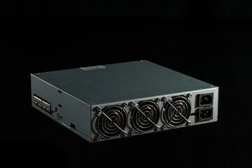 close-up of a power supply on a black background, technology concept