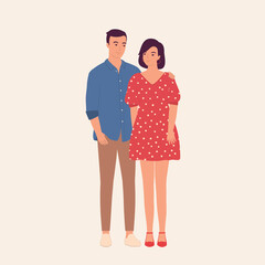 Portrait Of Young Couple Smiling With Arms Around.