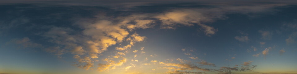 Dark blue sunset sky panorama with golden Cumulus clouds. Seamless hdr 360 panorama in spherical equirectangular format. Full zenith for 3D visualization, sky replacement for aerial drone panoramas.