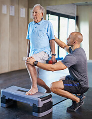 The long road to rehabilitation. Cropped shot of a handsome personal trainer with a senior man.