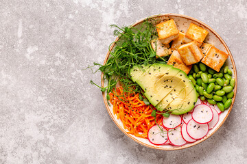 Buddha bowl asian salad with tofu cheese.