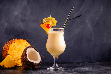 Traditional caribbean cocktail pina colada in a glass. - obrazy, fototapety, plakaty