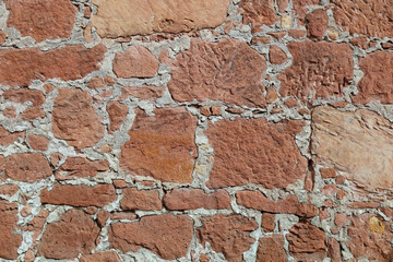 red natur stone wall background, stone wall texture