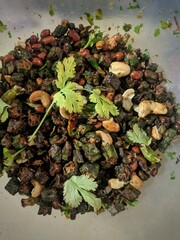 Indian masala fried bhindi or fried ladiesfinger with chappati, Okra fry / Bhindi Masala, ladies finger stir fry. Popular Indian side dish with okra served with Paratha or rice on side in Kerala India