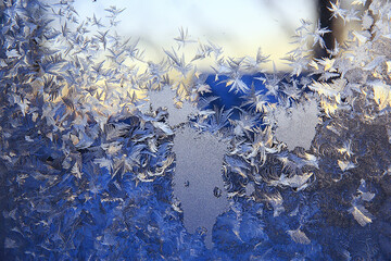 frost patterns on window glass, abstract background winter rime snow