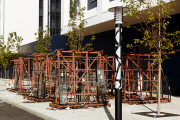 double-glazed windows on an iron stand stand outside