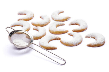 Traditional German or Austrian Vanillekipferl vanilla kipferl cookies isolated on white background