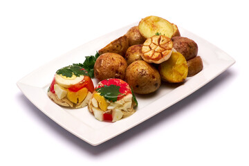 Portion of delicious chicken aspic and baked potato on a plate isolated on white background