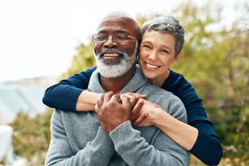 Our love got stronger over the years. Shot of a happy senior couple enjoying quality time at the park. - Powered by Adobe