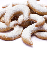 Traditional German or Austrian Vanillekipferl vanilla kipferl cookies isolated on white background