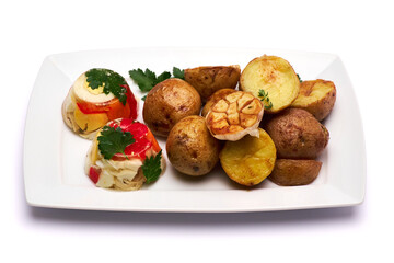 Portion of delicious chicken aspic and baked potato on a plate isolated on white background