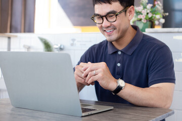 asian man work using computer hand typing laptop keyboard contact us.student study learning education online.adult professional people chatting search at office.concept for technology device business