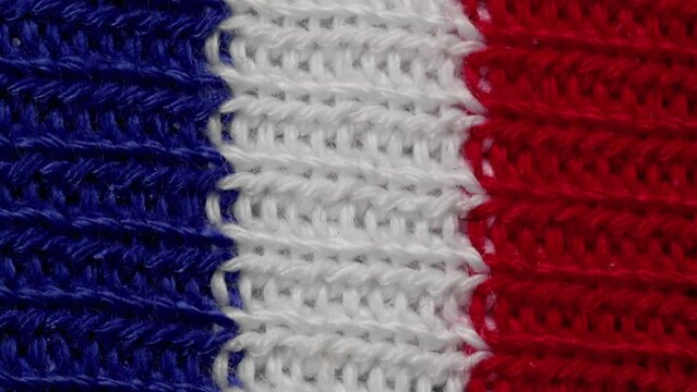 Macro view of fabric texture of french flag.slider shot.France flag background.video for presentation of Paris,Marseille,strasbourg,nice.French texture