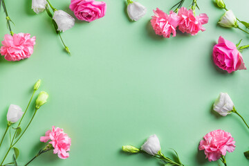 Pink and white flowers frame background