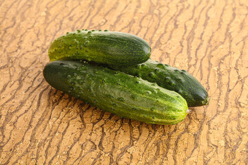 Fersh juicy green cucumbers heap