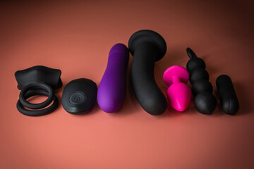 Sex toys on a colored background