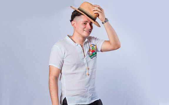 Man With Hat And Beach Shirt On Isolated Background, Concept Of A Man With Hat And Beach Shirt