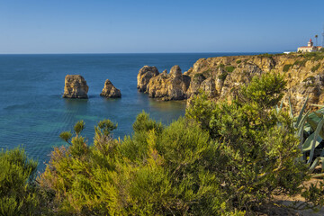 Panoramic view with Cliff, rocks and Ponta da Piedade Lighthouse at Ponta da Piedade near Lagos, Algarve, Portugal