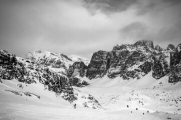 Stormy clouds in italian dolomites in a snowy winter