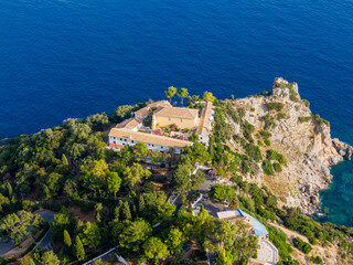 Fototapeta na wymiar Beautiful aerial drone view of Paleokastritsa Monastery in corfu island greece