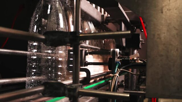 Melted milk is poured into an empty container at the factory