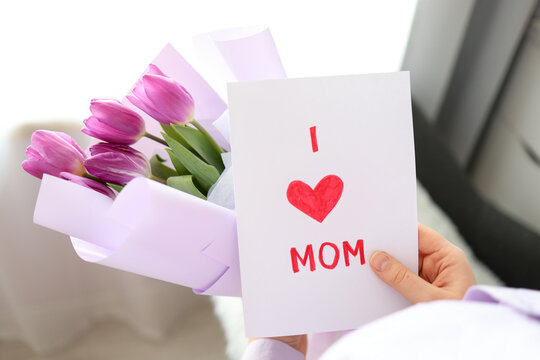 I love mom hand drawn card and flowers from a child for Mother's Day. Birthday or Mother's Day congratulations for mother
