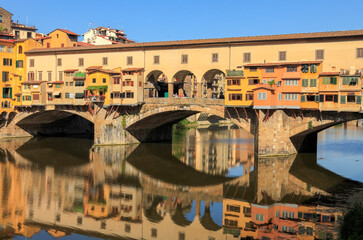 Fototapeta premium Reflection of the Ponte Vecchio on the Arno river, Florence, Tuscany, Italy, Europe