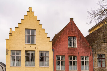 Fototapeta na wymiar Old traditional style buildings in Langerei street in Historic city of Bruges