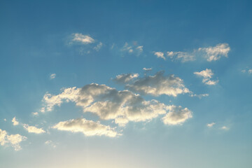 Fototapeta na wymiar Day clouds at blue sky . Sunny weather heaven