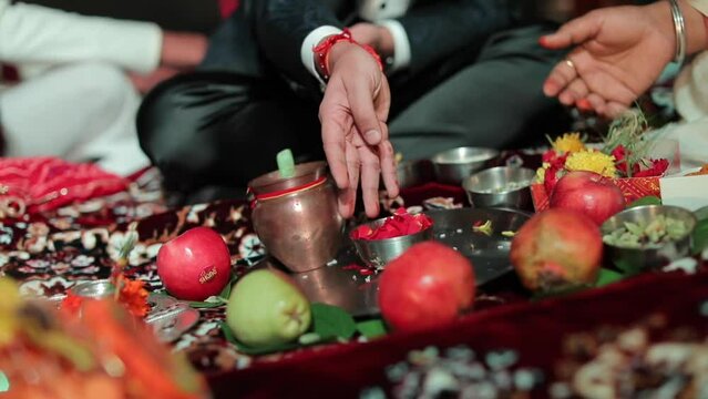 Rituals being done with an Indian Groom at his Indian Wedding in New Delhi,India
