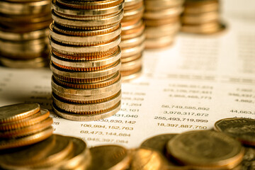 Pile of gold coins money stack in finance treasury deposit bank account saving . Concept of...